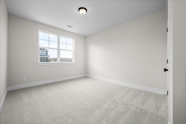 view of carpeted spare room