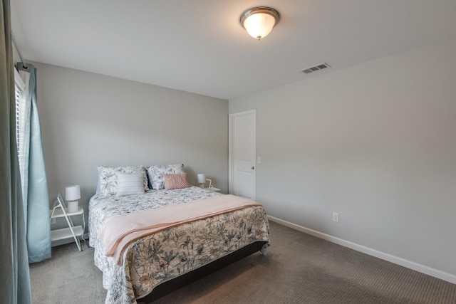 bedroom featuring carpet, visible vents, and baseboards