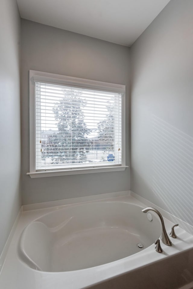 full bathroom featuring a bath