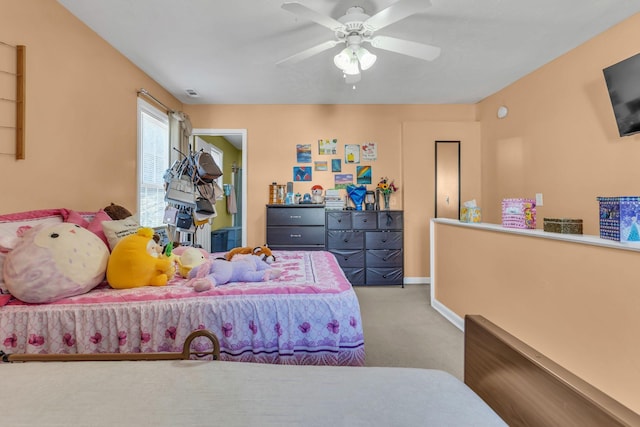 bedroom featuring light carpet and ceiling fan