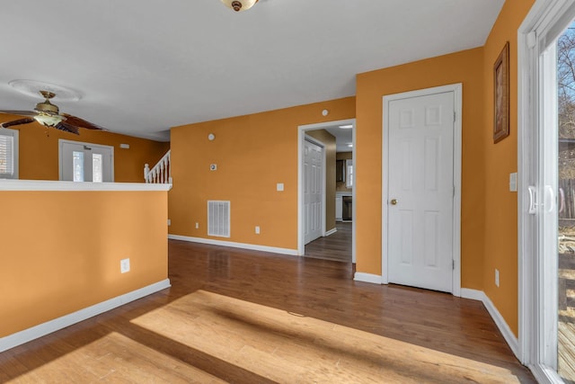 unfurnished room featuring hardwood / wood-style floors