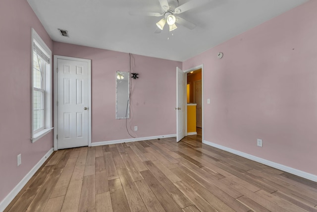 unfurnished bedroom with light hardwood / wood-style flooring and ceiling fan