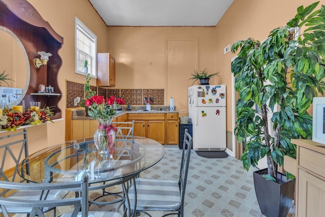 interior space featuring white refrigerator