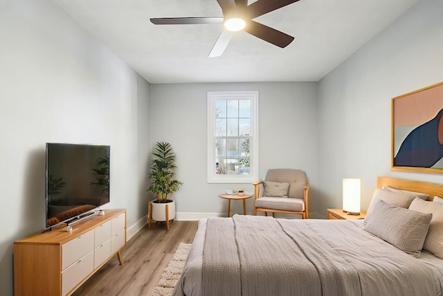 bedroom featuring ceiling fan and light wood-type flooring