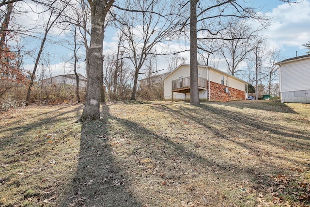 view of yard with a deck