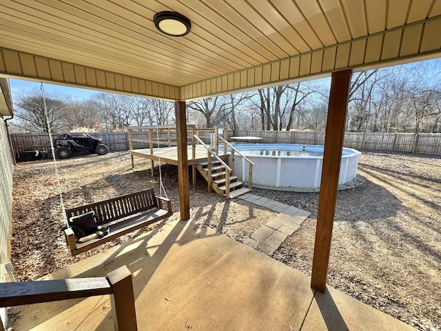 view of patio / terrace featuring a fenced in pool