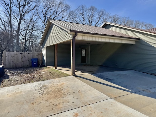 exterior space featuring a carport