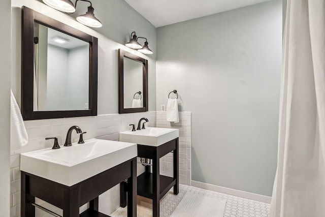 bathroom featuring tasteful backsplash and vanity