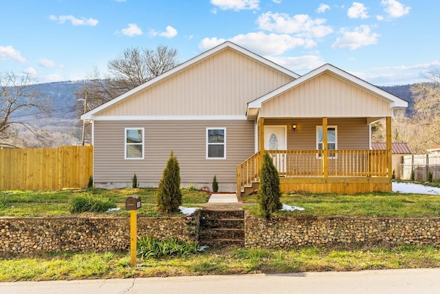 view of front of house with a mountain view and covered porch