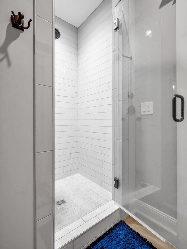 bathroom with an enclosed shower