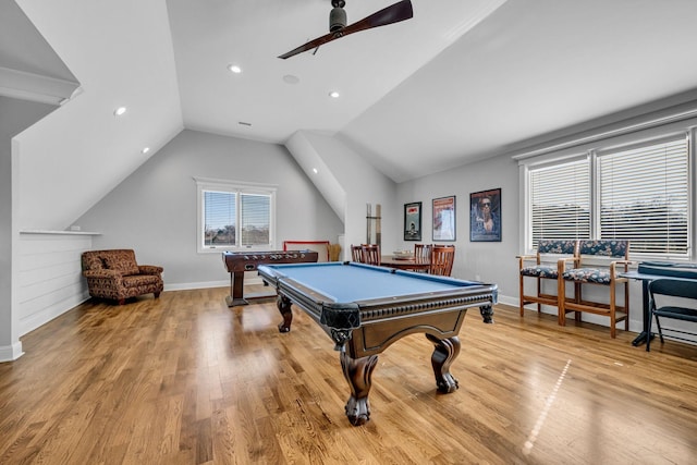 rec room with ceiling fan, vaulted ceiling, billiards, and light wood-type flooring