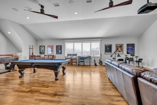 game room featuring vaulted ceiling, pool table, ceiling fan, and light hardwood / wood-style flooring