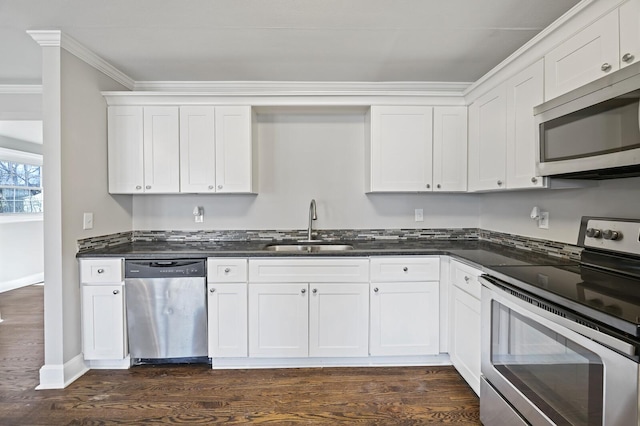 kitchen with crown molding, stainless steel appliances, sink, and white cabinets