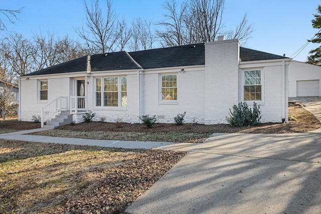 ranch-style house featuring a garage