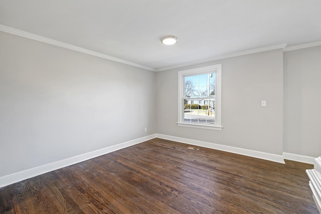 unfurnished room with dark wood-type flooring and crown molding