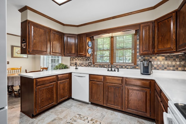 kitchen with sink, range, white dishwasher, decorative backsplash, and kitchen peninsula