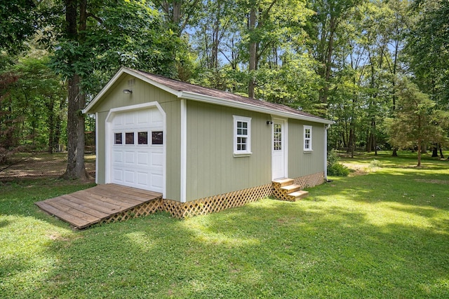 garage featuring a yard