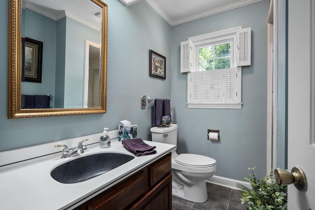 bathroom with crown molding, vanity, toilet, and tile patterned flooring