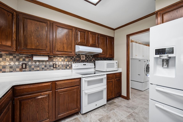 kitchen featuring tasteful backsplash, crown molding, washer / dryer, and white appliances