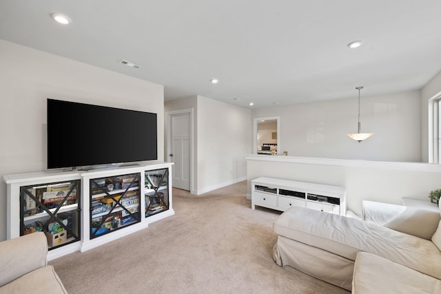 living room featuring light colored carpet