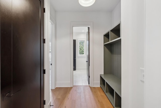 mudroom with light wood-type flooring