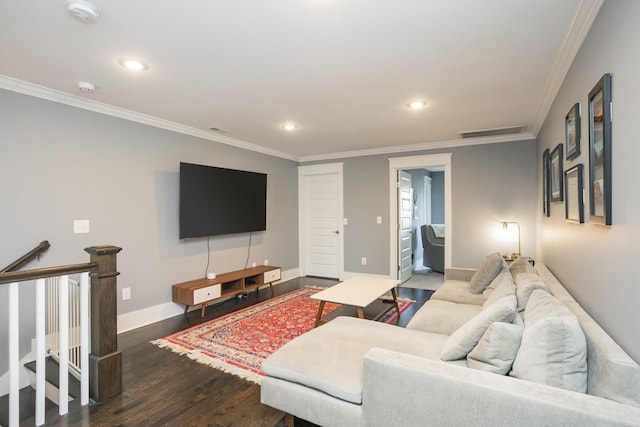 living room featuring crown molding and dark hardwood / wood-style floors