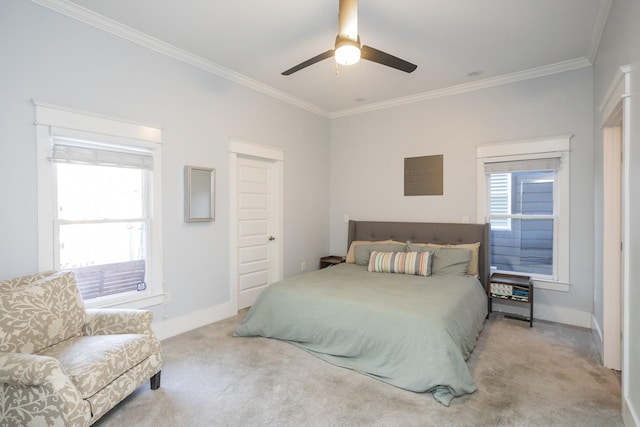 bedroom with ornamental molding, light colored carpet, and ceiling fan