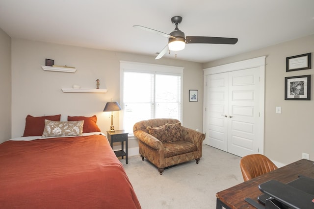 bedroom with carpet floors, ceiling fan, and a closet