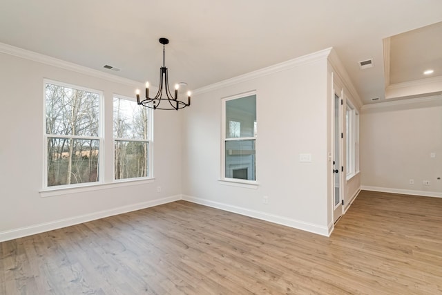 interior space with ornamental molding, visible vents, and light wood-style floors