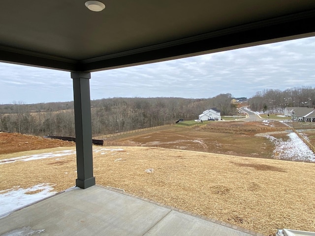 view of yard featuring a view of trees