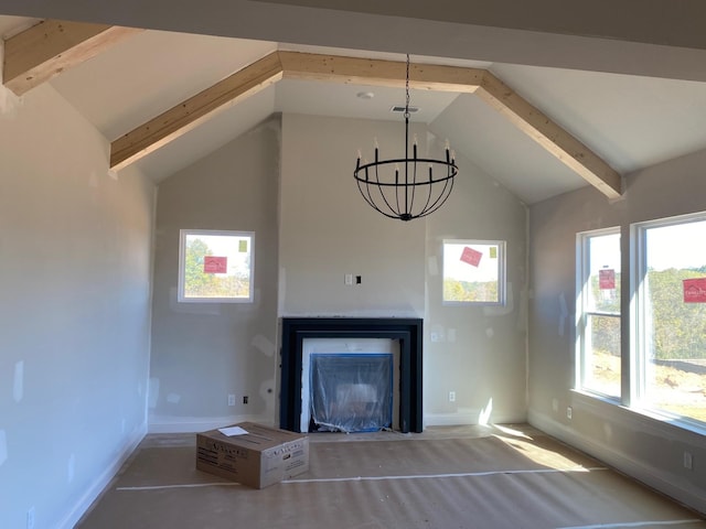 unfurnished living room featuring lofted ceiling with beams, a chandelier, and a fireplace