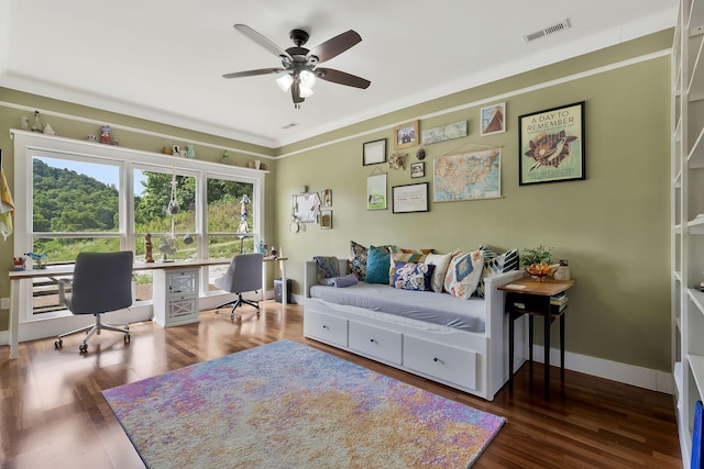 interior space featuring crown molding, dark hardwood / wood-style floors, and ceiling fan