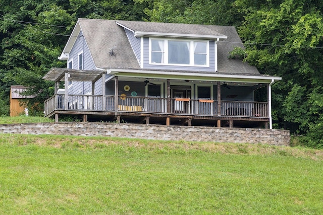 view of front of home featuring a pergola and a front yard