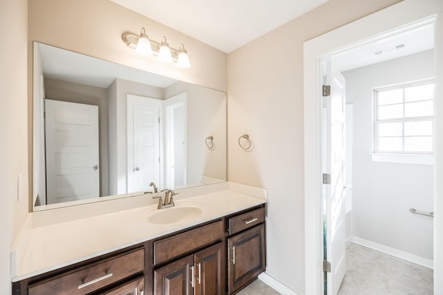 bathroom featuring vanity