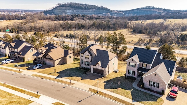 drone / aerial view featuring a mountain view