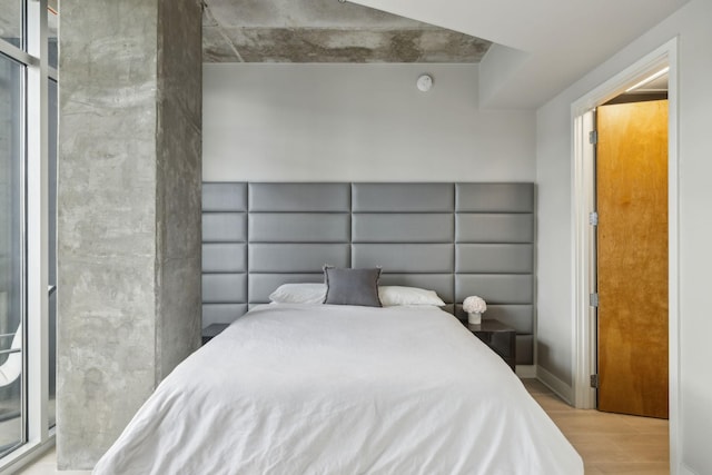 bedroom with light hardwood / wood-style floors