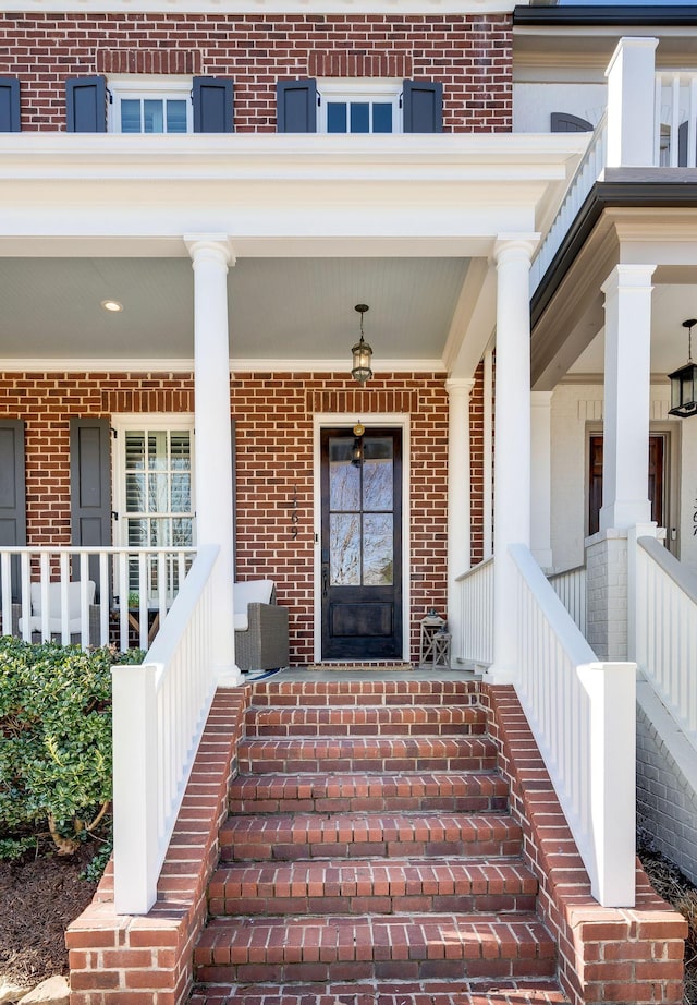 property entrance featuring a porch