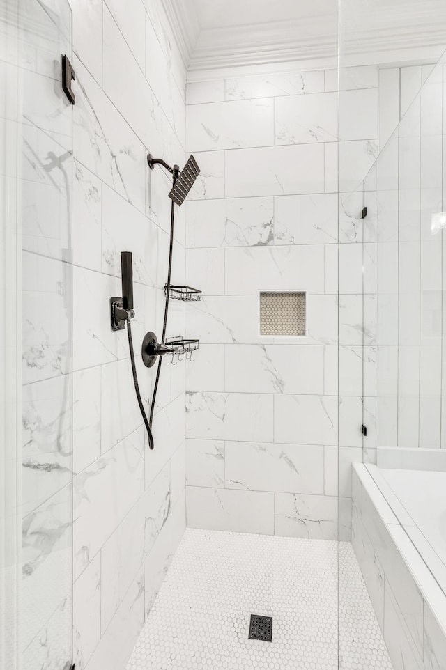 bathroom with a tile shower