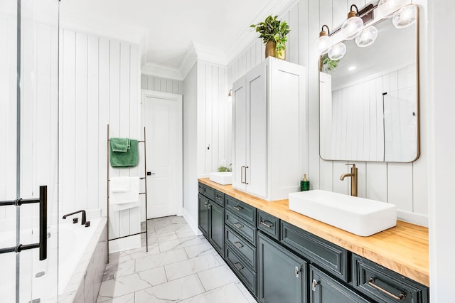 bathroom with ornamental molding, separate shower and tub, and vanity