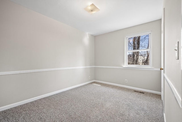 empty room featuring carpet