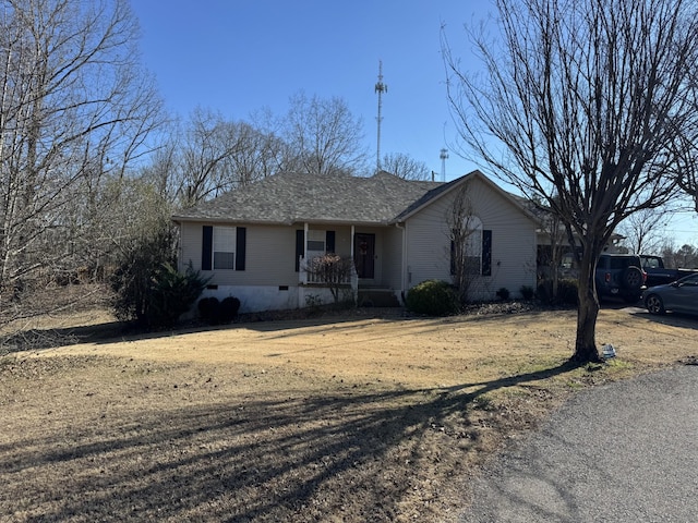 ranch-style house with a front yard