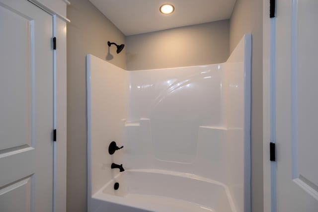 bathroom with shower / bath combination