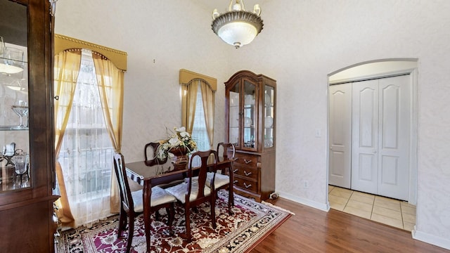 dining area with hardwood / wood-style floors