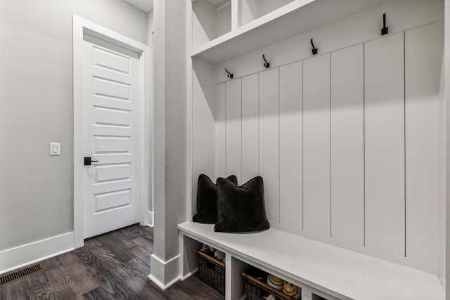 mudroom with dark wood-type flooring