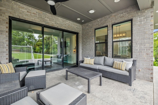 view of patio featuring outdoor lounge area and ceiling fan