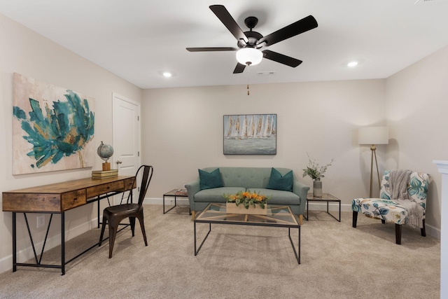 living room with light carpet and ceiling fan