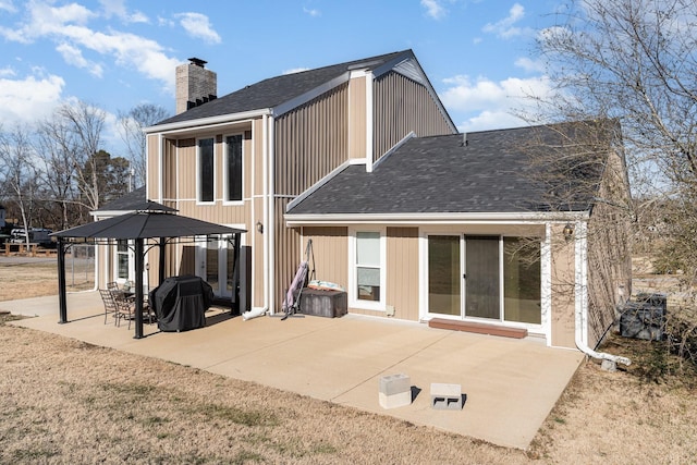 back of house featuring a patio area