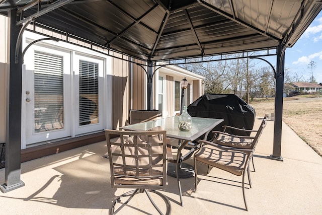 view of patio / terrace featuring a gazebo and grilling area