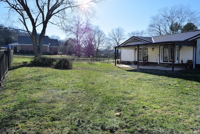 view of yard with a porch and a patio area