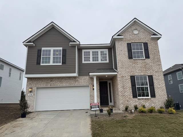 view of front of home with a garage, central AC unit, and a front lawn